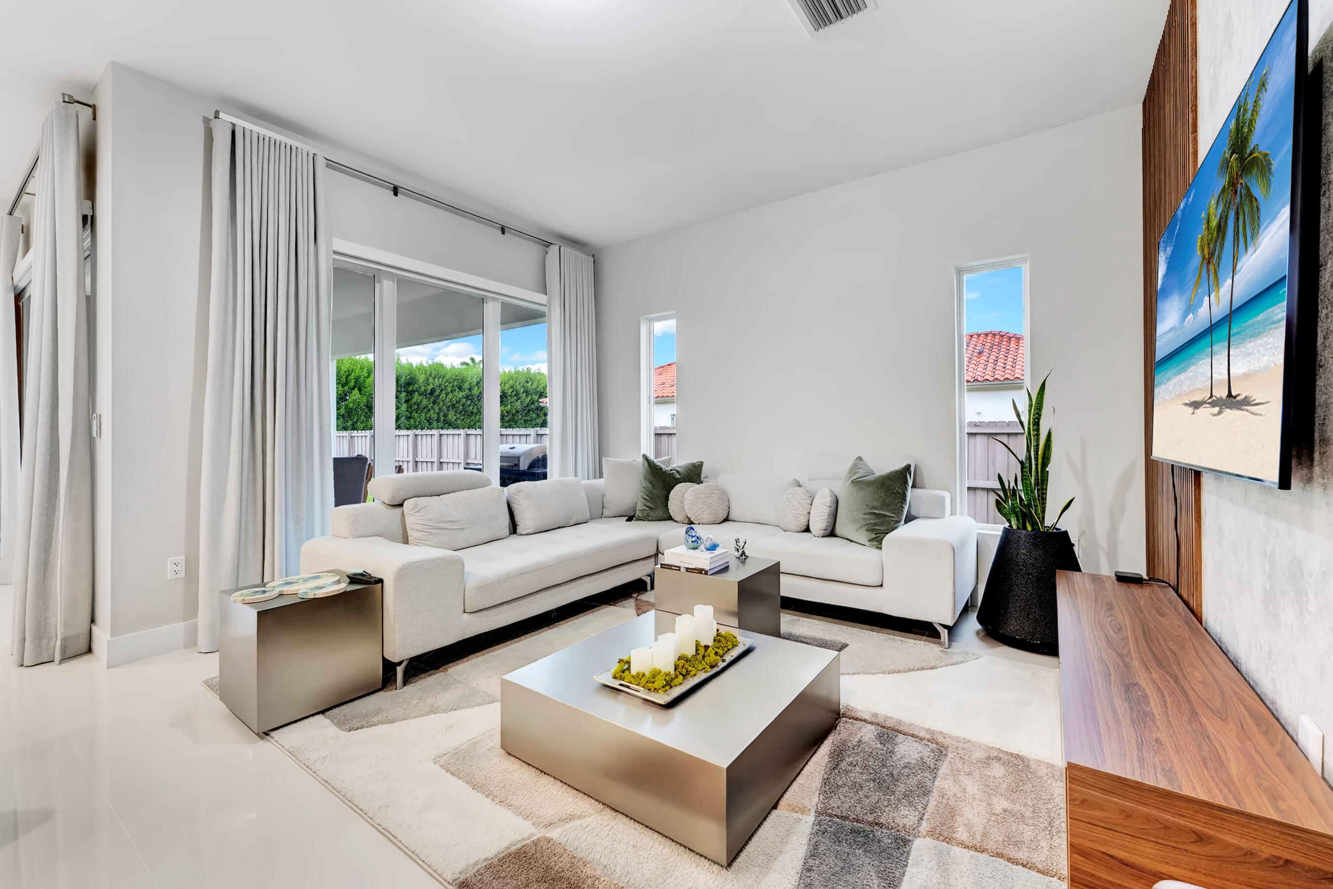 21205 Ingraham Ave Road Cutler Bay, FL 33189 - Photo 18 of 45 a living room with furniture and a large window