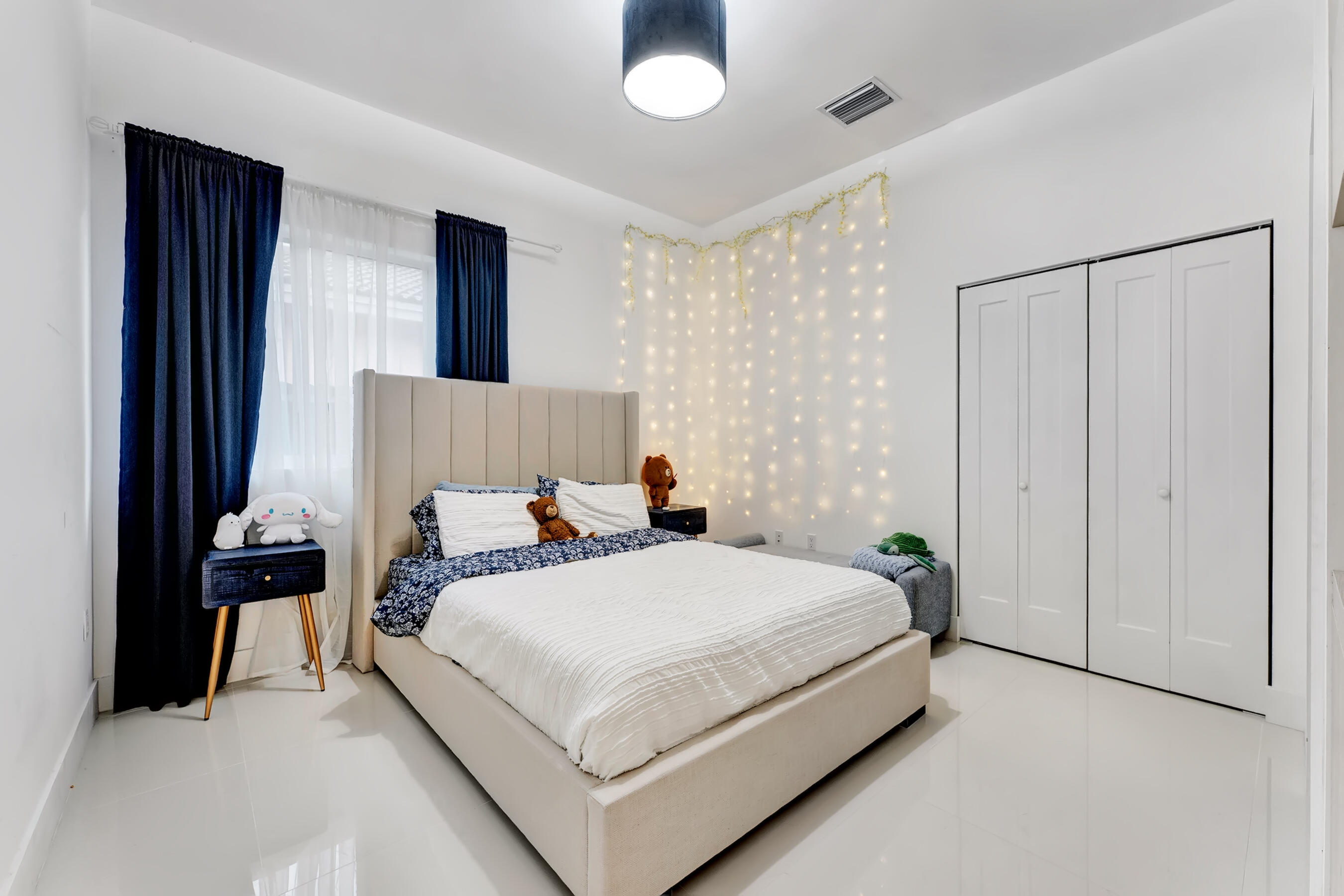 21205 Ingraham Ave Road Cutler Bay, FL 33189 - Photo 29 of 45 a bedroom with a bed and a potted plant