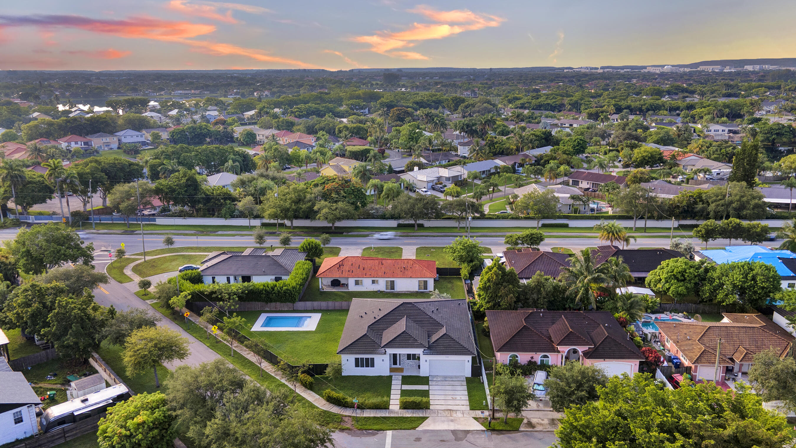 21205 Ingraham Ave Road Cutler Bay, FL 33189 - Photo 41 of 45 an aerial view of residential houses with outdoor space and lake view