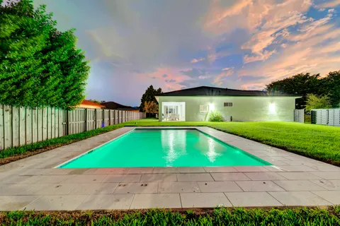 a house with yard in front of it