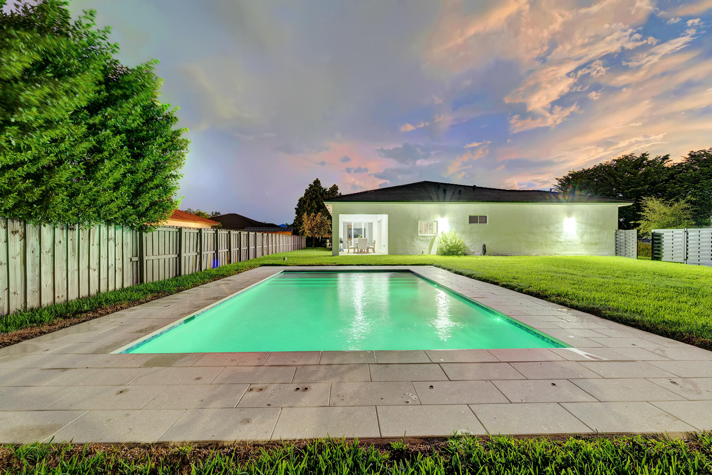 21205 Ingraham Ave Road Cutler Bay, FL 33189 - Photo 5 of 45 a house with yard in front of it