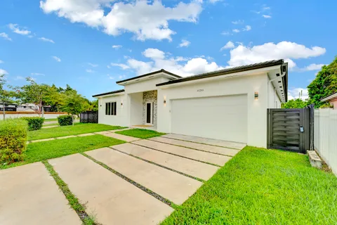 a view of outdoor space yard and garage