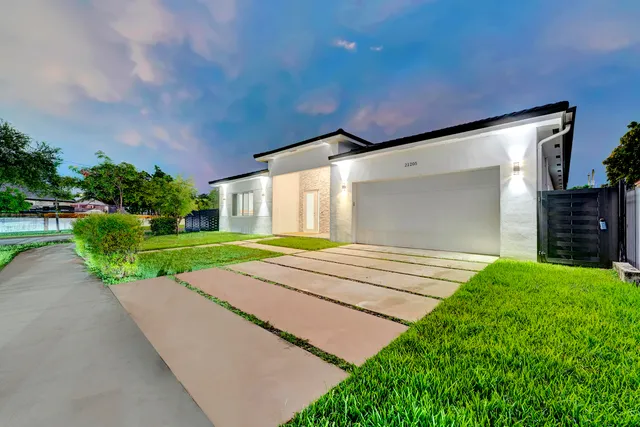 a view of backyard with a garden and plants