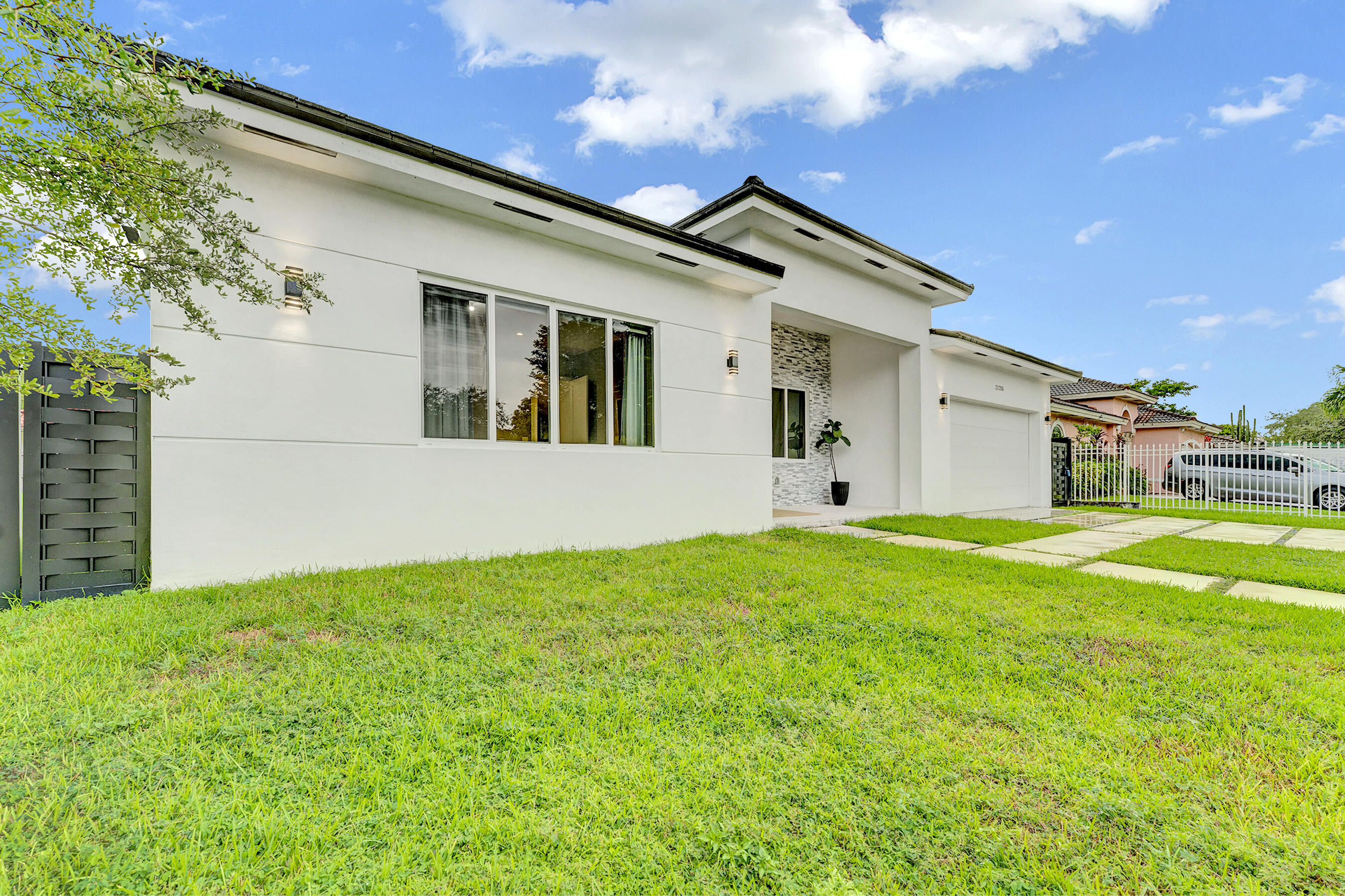 21205 Ingraham Ave Road Cutler Bay, FL 33189 - Photo 8 of 45 a view of a house with backyard and garden