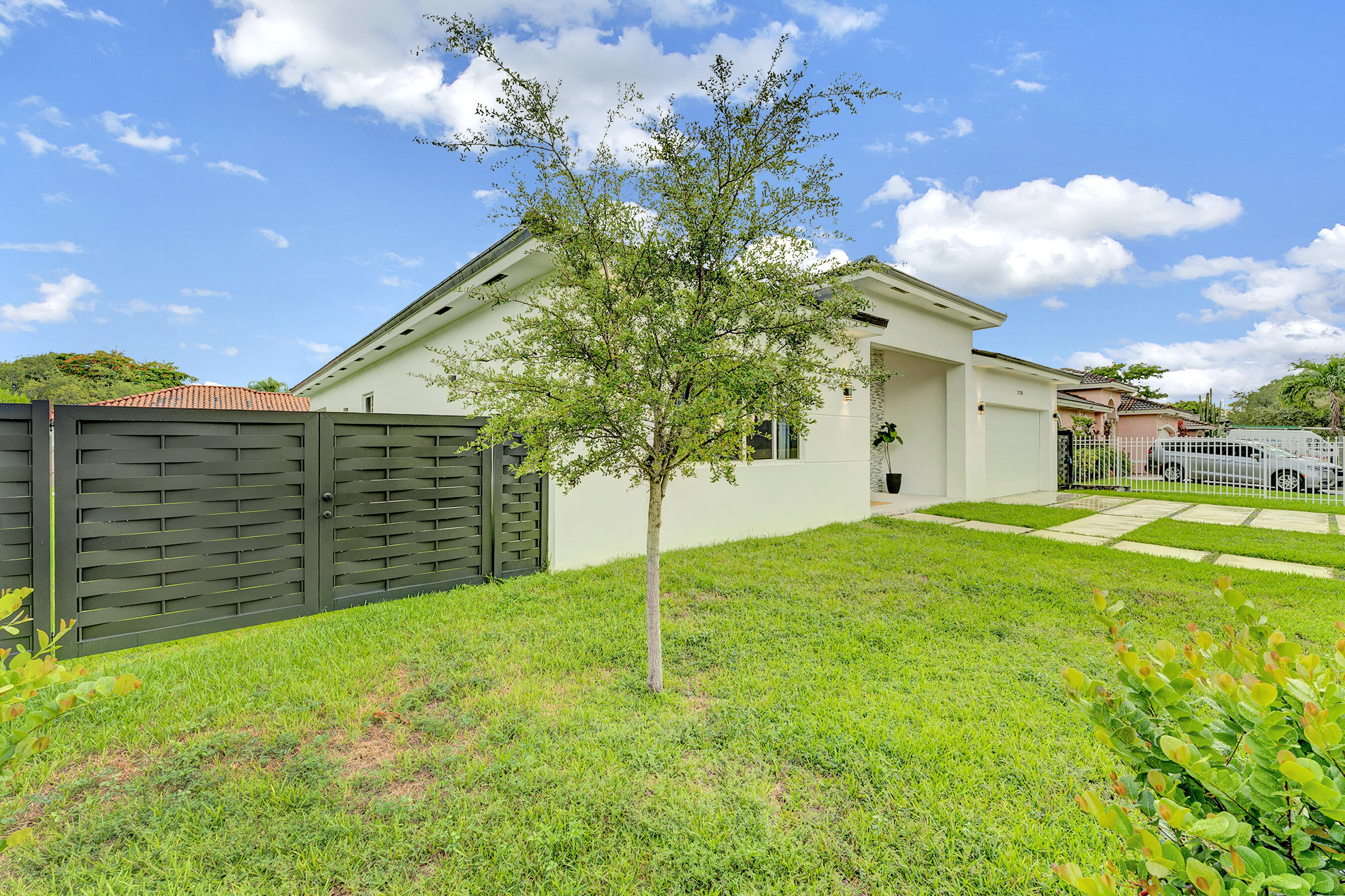 21205 Ingraham Ave Road Cutler Bay, FL 33189 - Photo 10 of 45 a view of a house with a yard