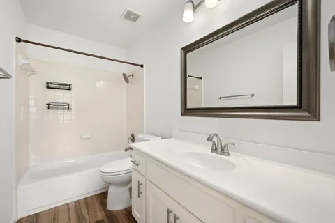 a view of storage and utility room with washer and dryer