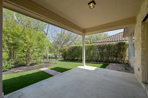 a view of backyard with green space