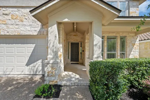a front view of a house with a porch