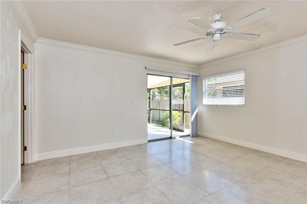 671 98th Avenue North Naples, FL 34108 - Photo 15 of 27 a view of an empty room with a window