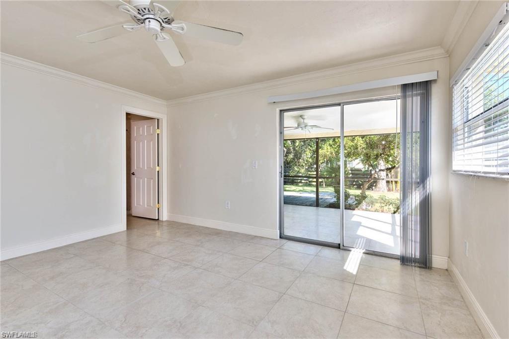 671 98th Avenue North Naples, FL 34108 - Photo 16 of 27 a view of an empty room with a window