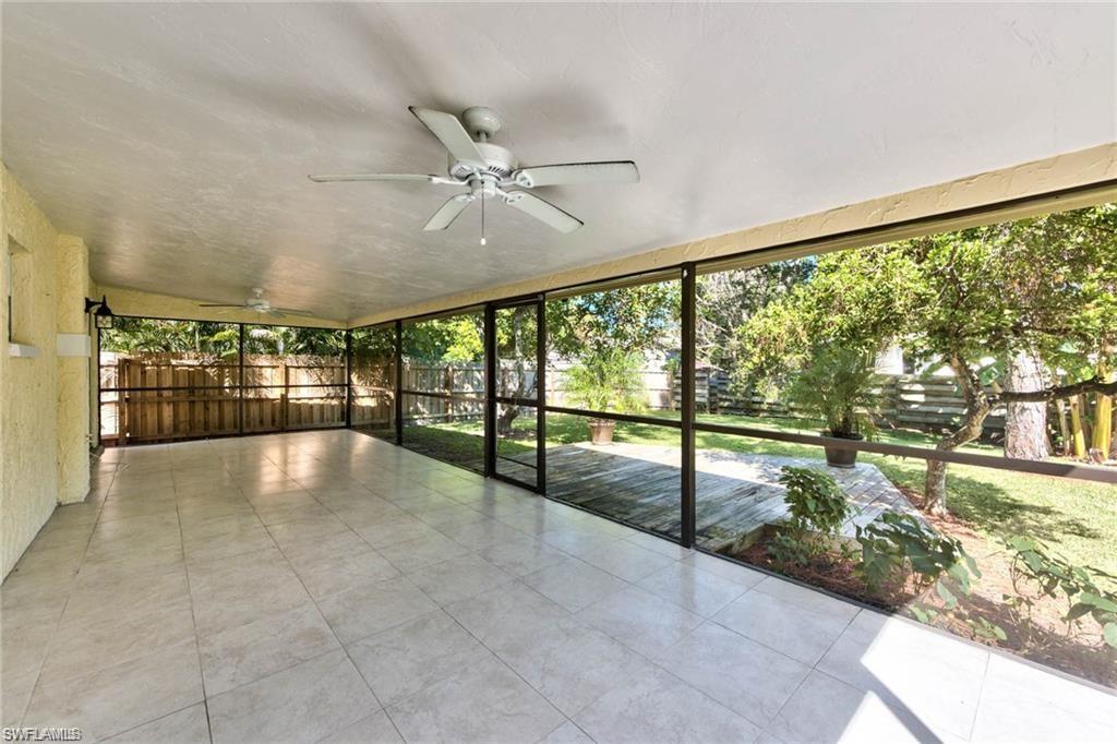 671 98th Avenue North Naples, FL 34108 - Photo 2 of 27 a view of an entryway with a floor to ceiling window