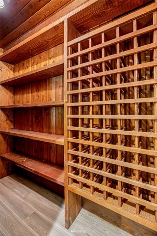 a view of front door with furniture and a window