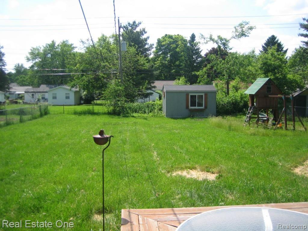 5299 Sashabaw Road Clarkston, MI 48346 - Photo 10 of 12 YARD FROM HOUSE