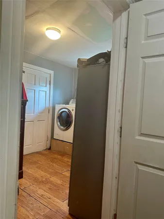 a view of a storage & utility room with washer and dryer