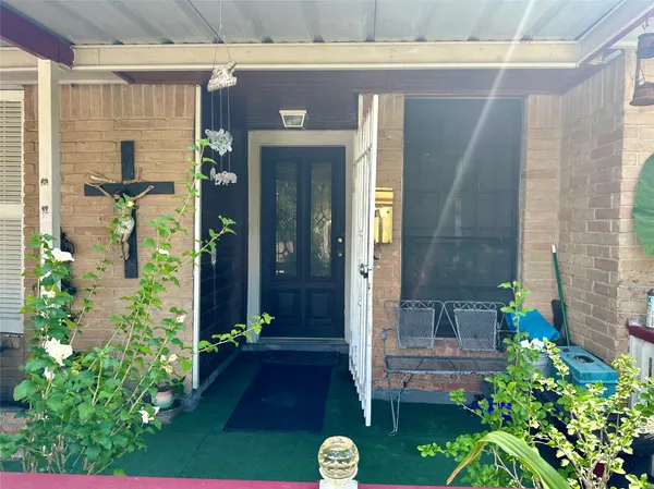 a front view of a house with a porch