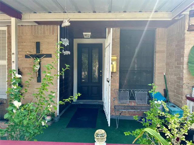 a front view of a house with a porch