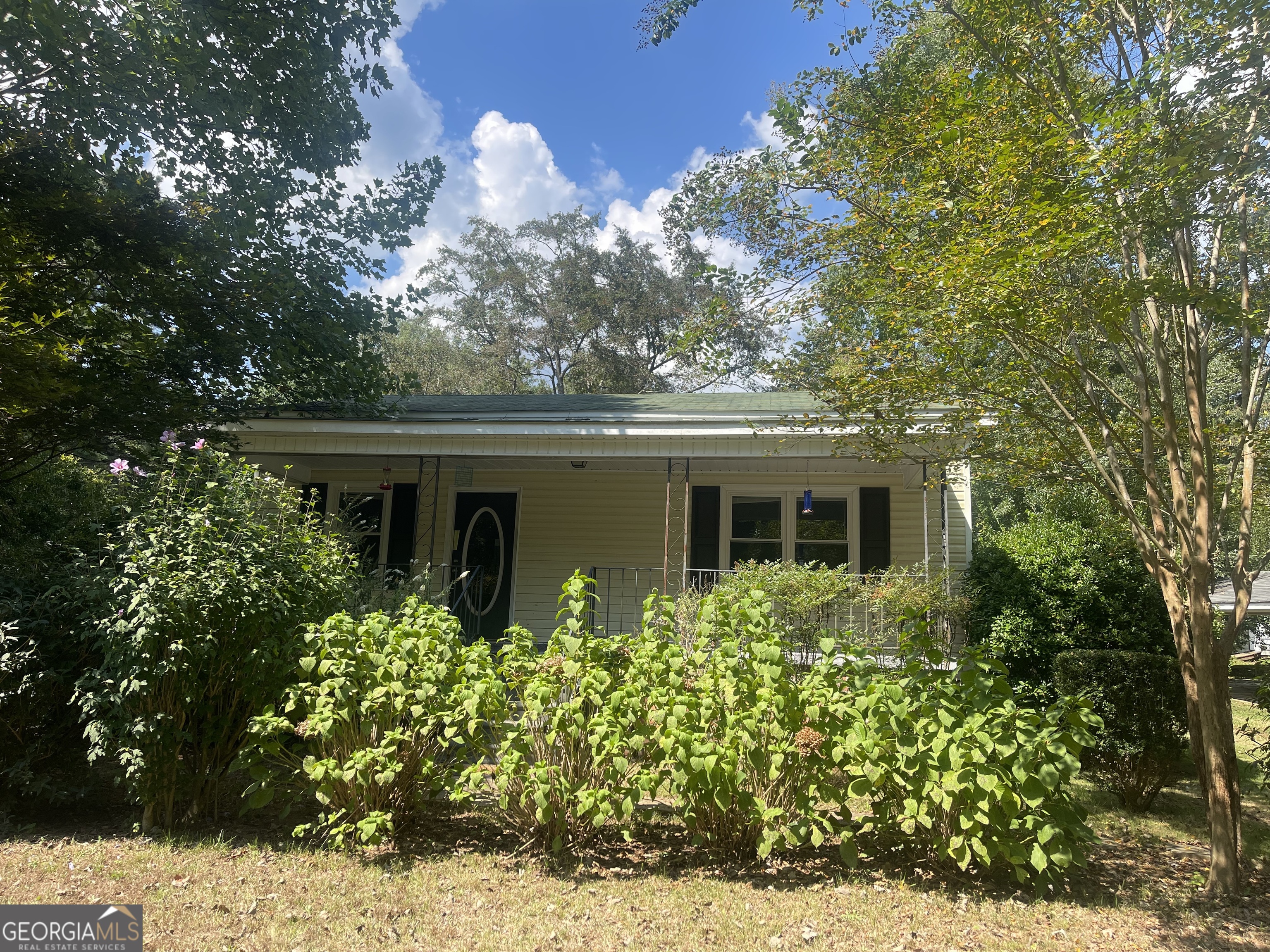 201 Franklindale Road Thomaston, GA 30286 - Photo 1 of 1 a view of a house with a flower garden