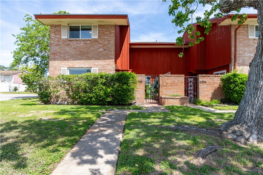 6232 Weber Road Corpus Christi, TX 78413 - Photo 1 of 23 a backyard of a house with lots of green space