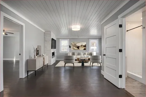 a bedroom with a bed and a desk