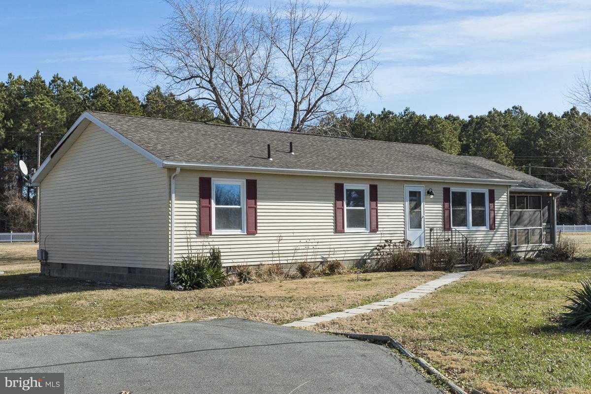 5415 Anchor Road Tilghman, MD 21671 - Photo 1 of 27 Front view with paved drive