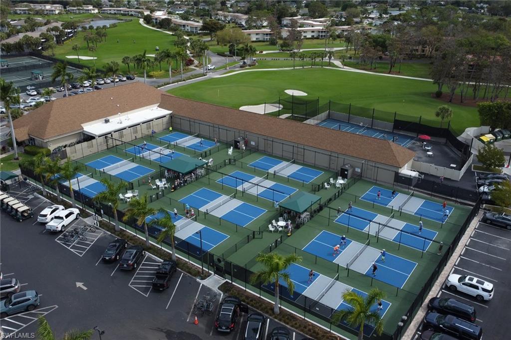 348 Tern Drive, Unit 4 Naples, FL 34112 - Photo 22 of 26 an aerial view of a city
