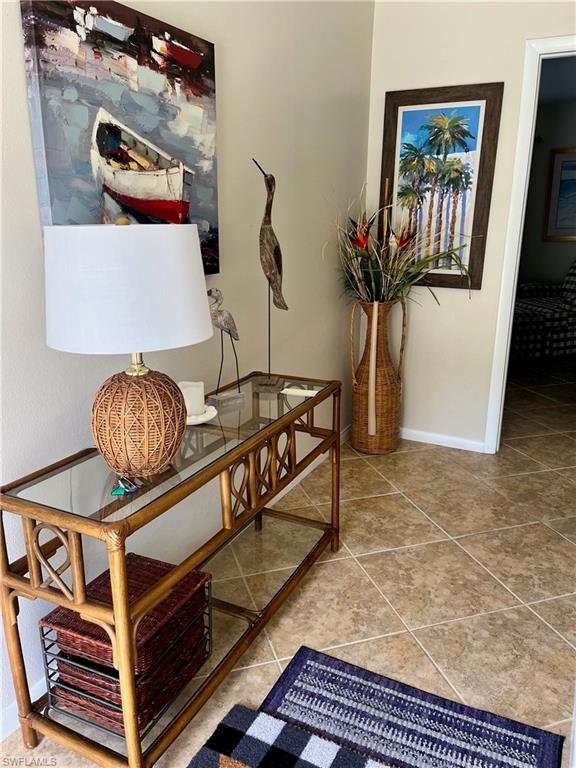 348 Tern Drive, Unit 4 Naples, FL 34112 - Photo 3 of 26 a view of a hallway with seating area