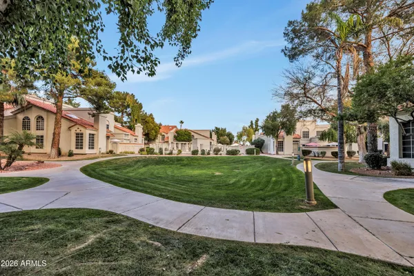 a view of a house with a back yard