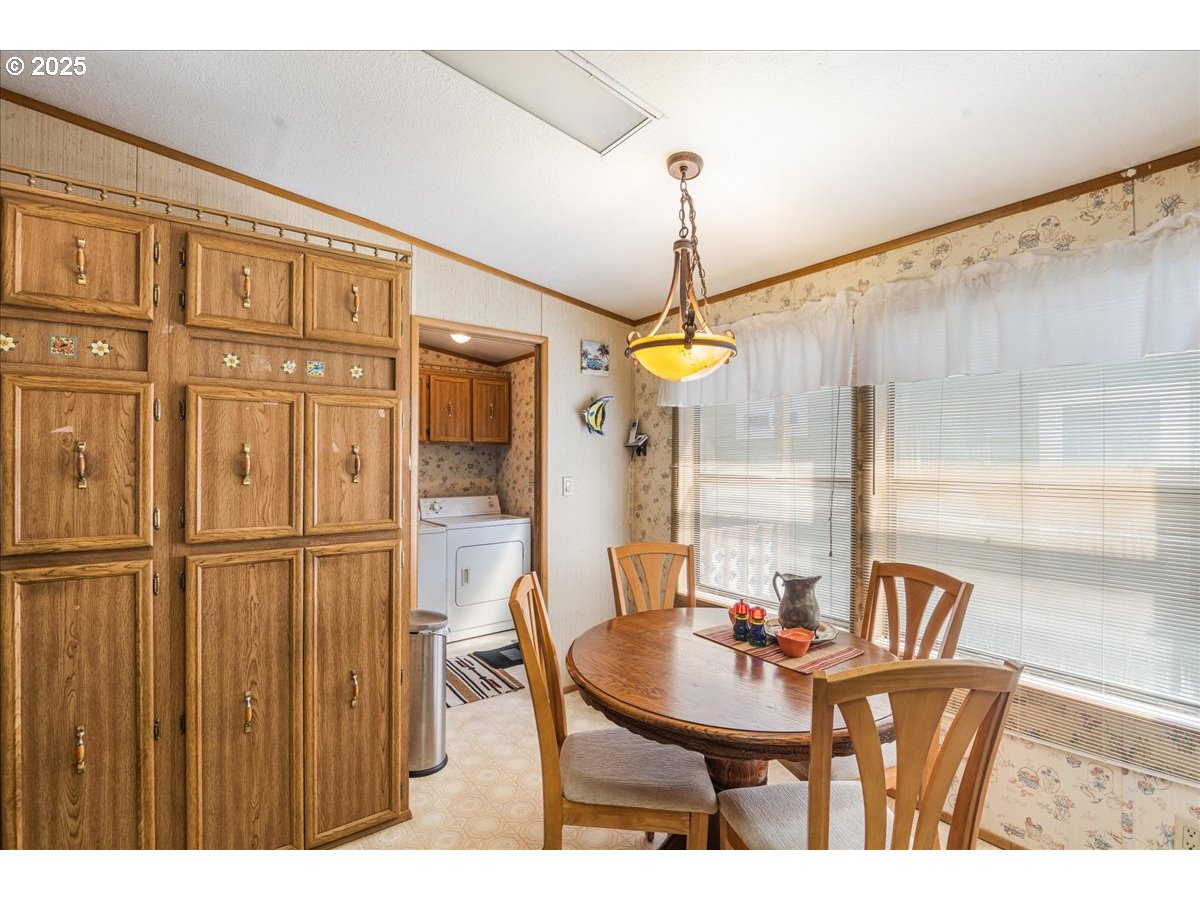 300 Southwest 7th Avenue, Unit 302 Battle Ground, WA 98604 - Photo 12 of 41 a view of a dining room with furniture