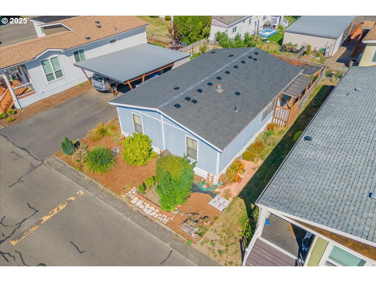 300 Southwest 7th Avenue, Unit 302 Battle Ground, WA 98604 - Photo 31 of 41 an aerial view of residential houses with outdoor space