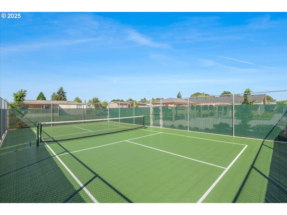 300 Southwest 7th Avenue, Unit 302 Battle Ground, WA 98604 - Photo 38 of 41 a view of an outdoor space and tennis court