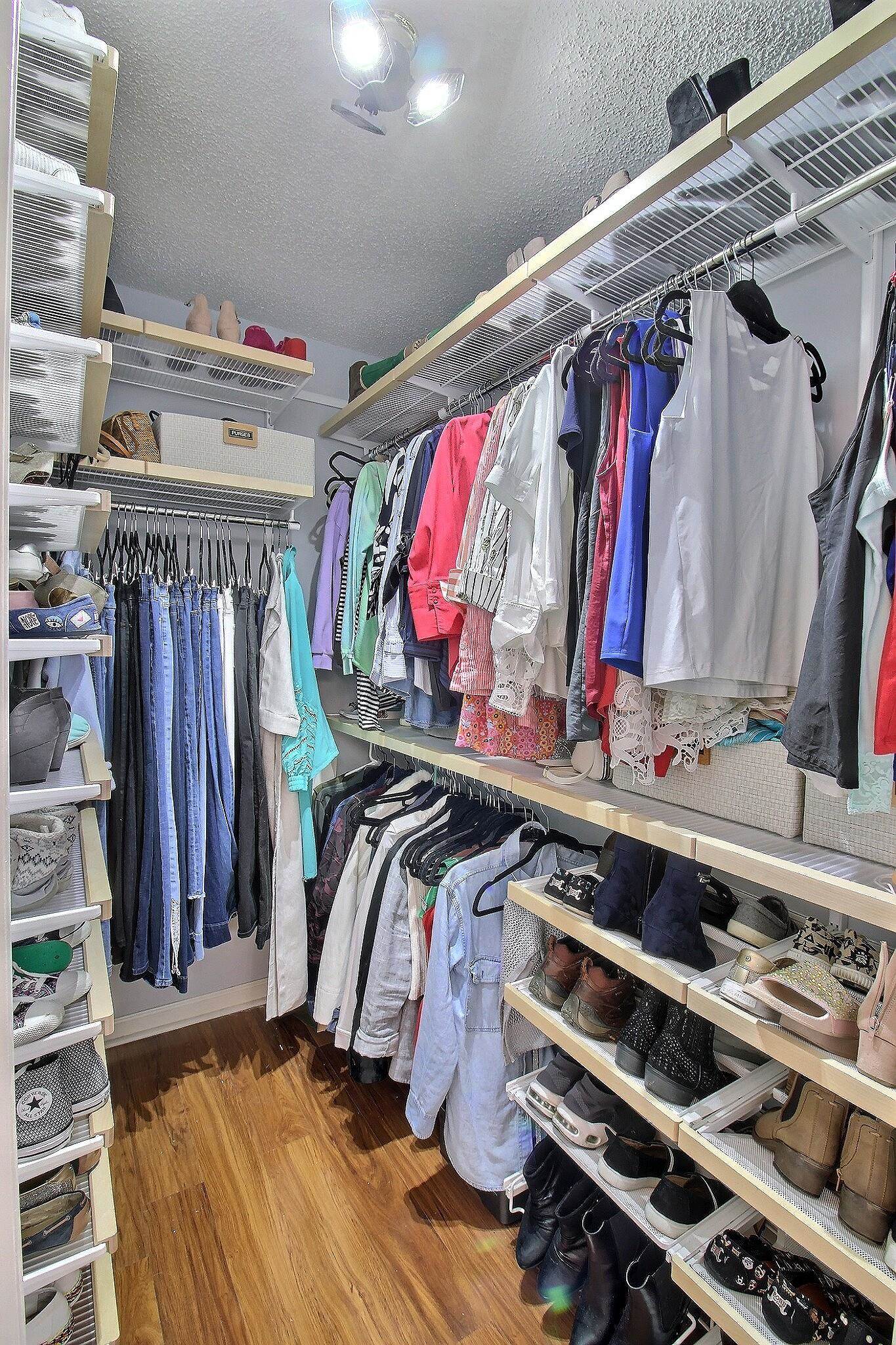 4530 Park Ridge Parkway Collierville, TN 38017 - Photo 18 of 27 a view of walk in closet with clothes