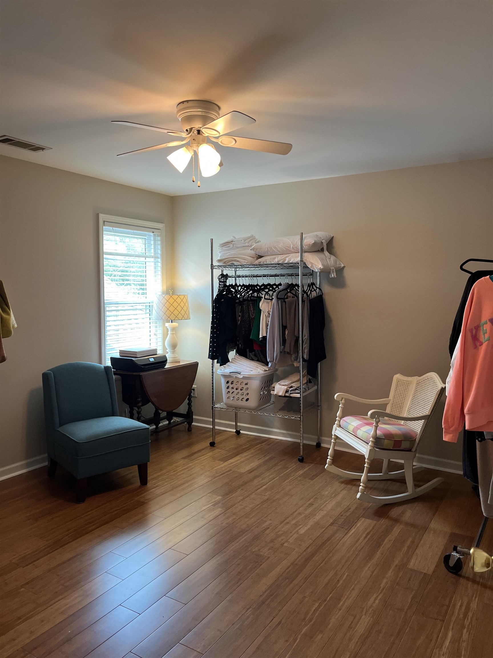 4530 Park Ridge Parkway Collierville, TN 38017 - Photo 21 of 27 a living room with furniture and a wooden floor