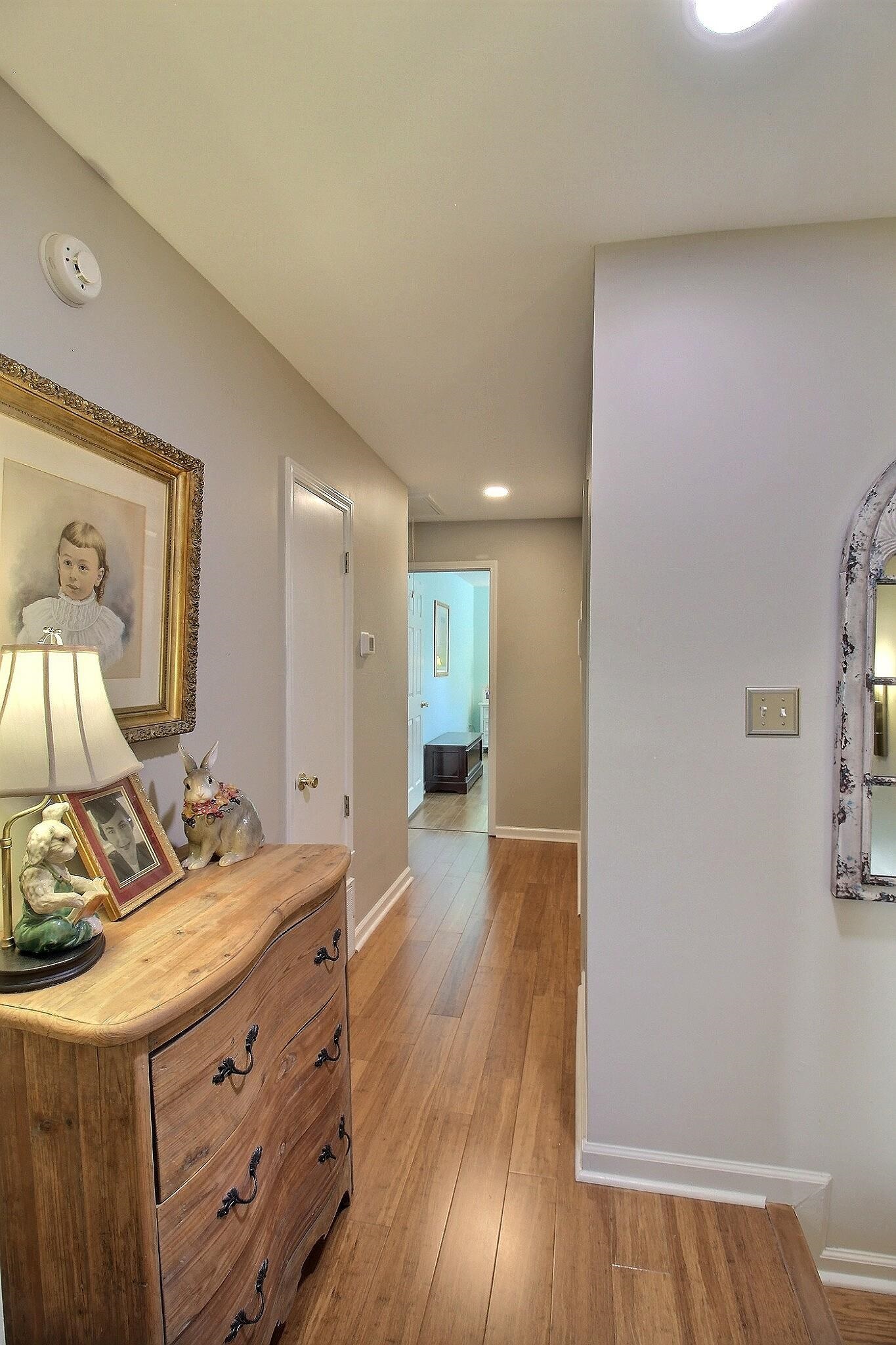 4530 Park Ridge Parkway Collierville, TN 38017 - Photo 22 of 27 a room with a bed and a wooden floor