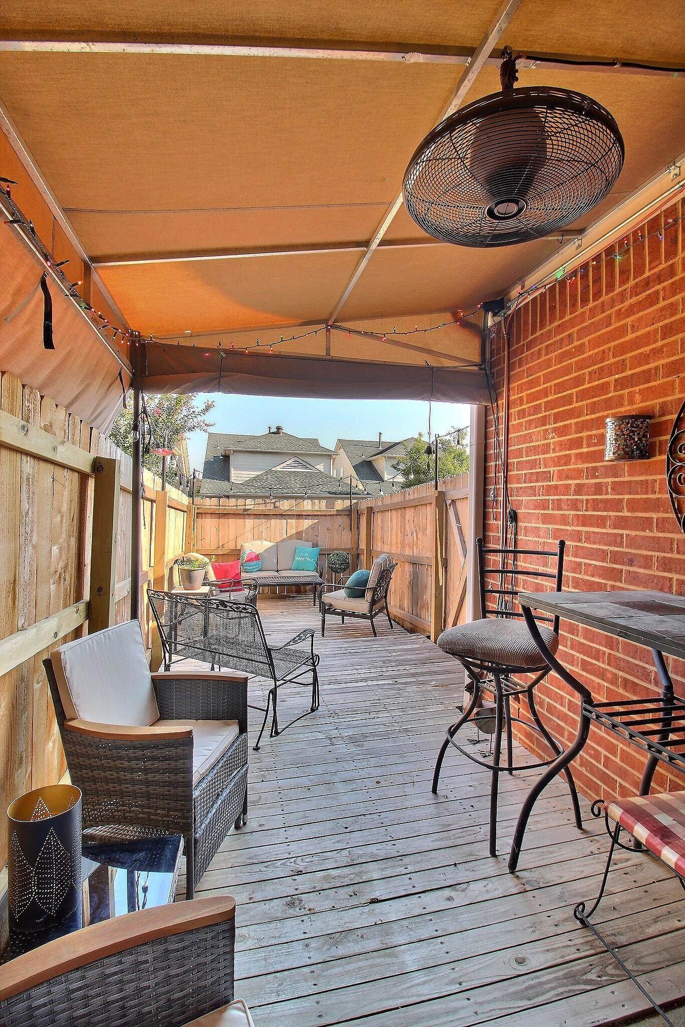 4530 Park Ridge Parkway Collierville, TN 38017 - Photo 25 of 27 a outdoor space with patio the couches and a potted plant