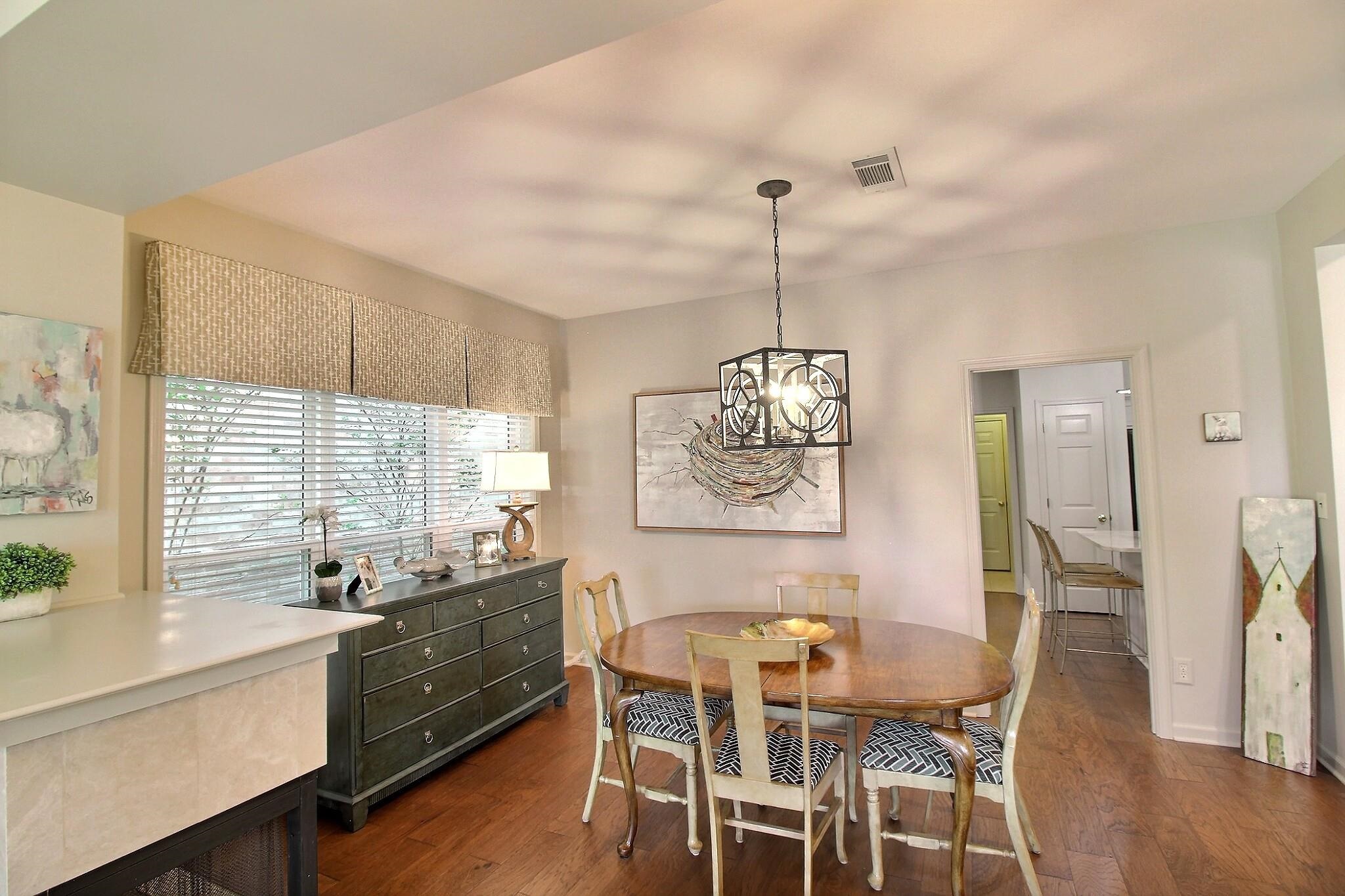 4530 Park Ridge Parkway Collierville, TN 38017 - Photo 5 of 27 a view of a dining room with furniture window and wooden floor