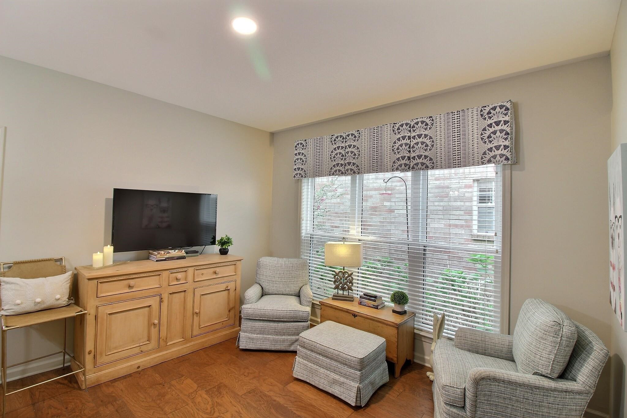 4530 Park Ridge Parkway Collierville, TN 38017 - Photo 7 of 27 a living room with furniture and a flat screen tv