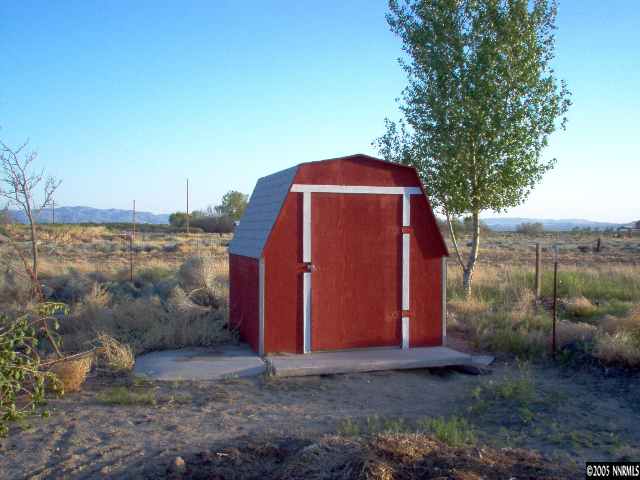 4000 Lone Tree Road Fallon, NV 89406 - Photo 4 of 8 a view of a barn with a yard