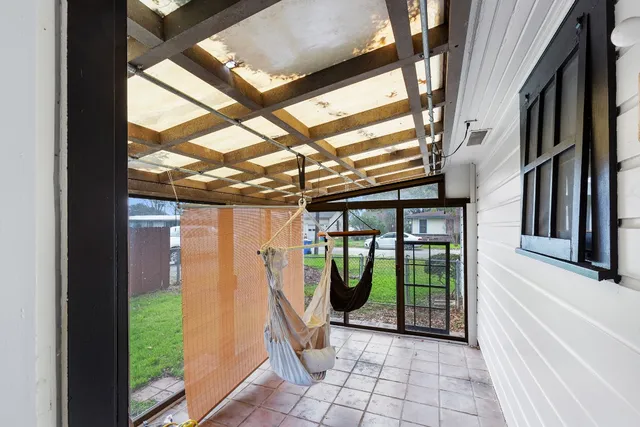 a view of a porch with a backyard