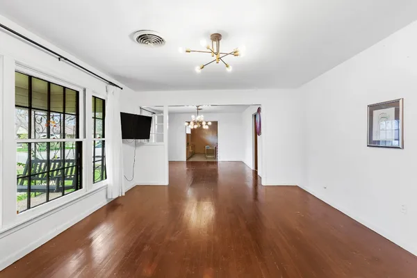 a view of a livingroom with wooden floor