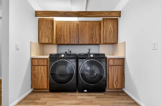 a utility room with dryer and washer