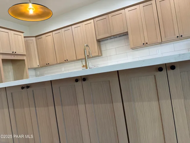 a bathroom with a tub and a shower