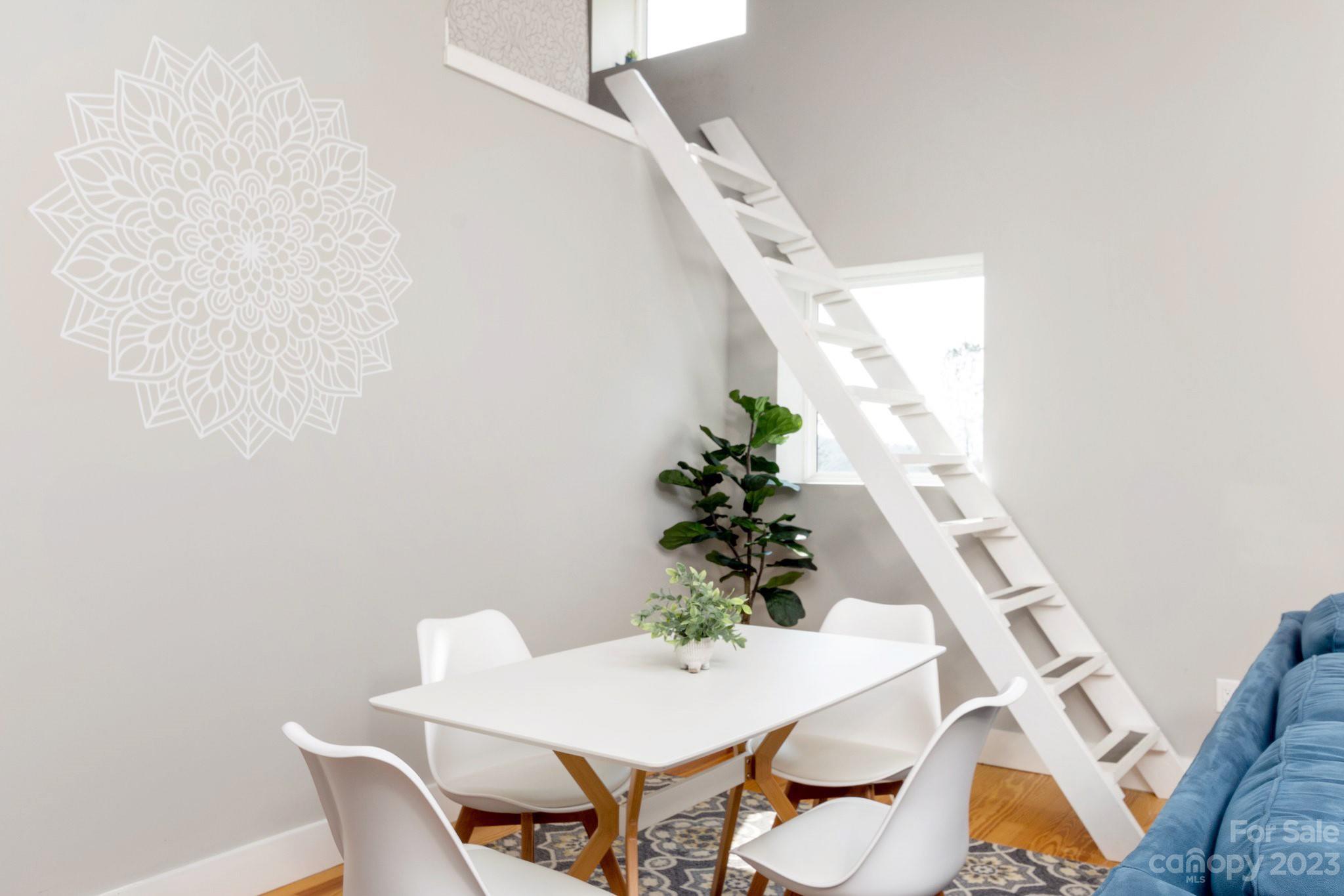 43 Kirkman Road Asheville, NC 28805 - Photo 12 of 27 a view of a dining room with furniture and wooden floor