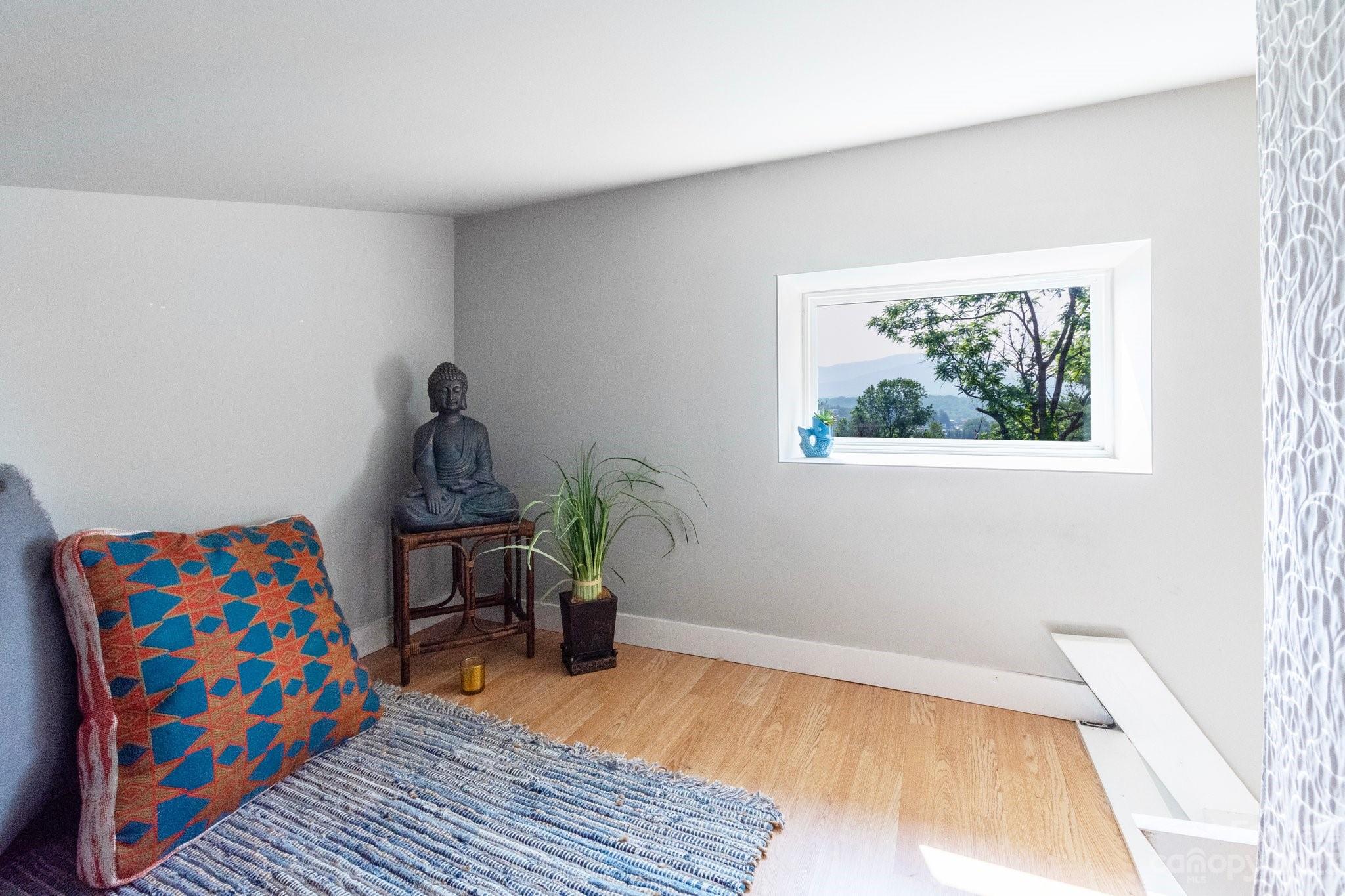 43 Kirkman Road Asheville, NC 28805 - Photo 13 of 27 a room with furniture and a window