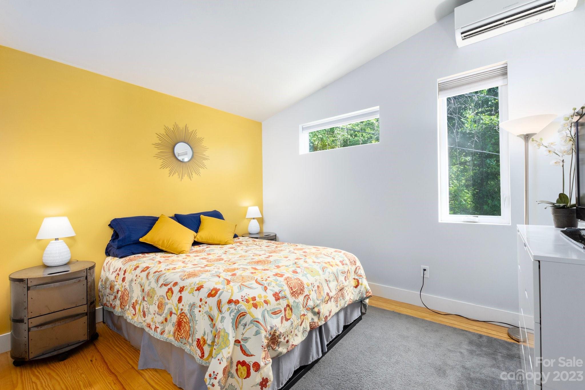 43 Kirkman Road Asheville, NC 28805 - Photo 15 of 27 a bedroom with a bed and a window