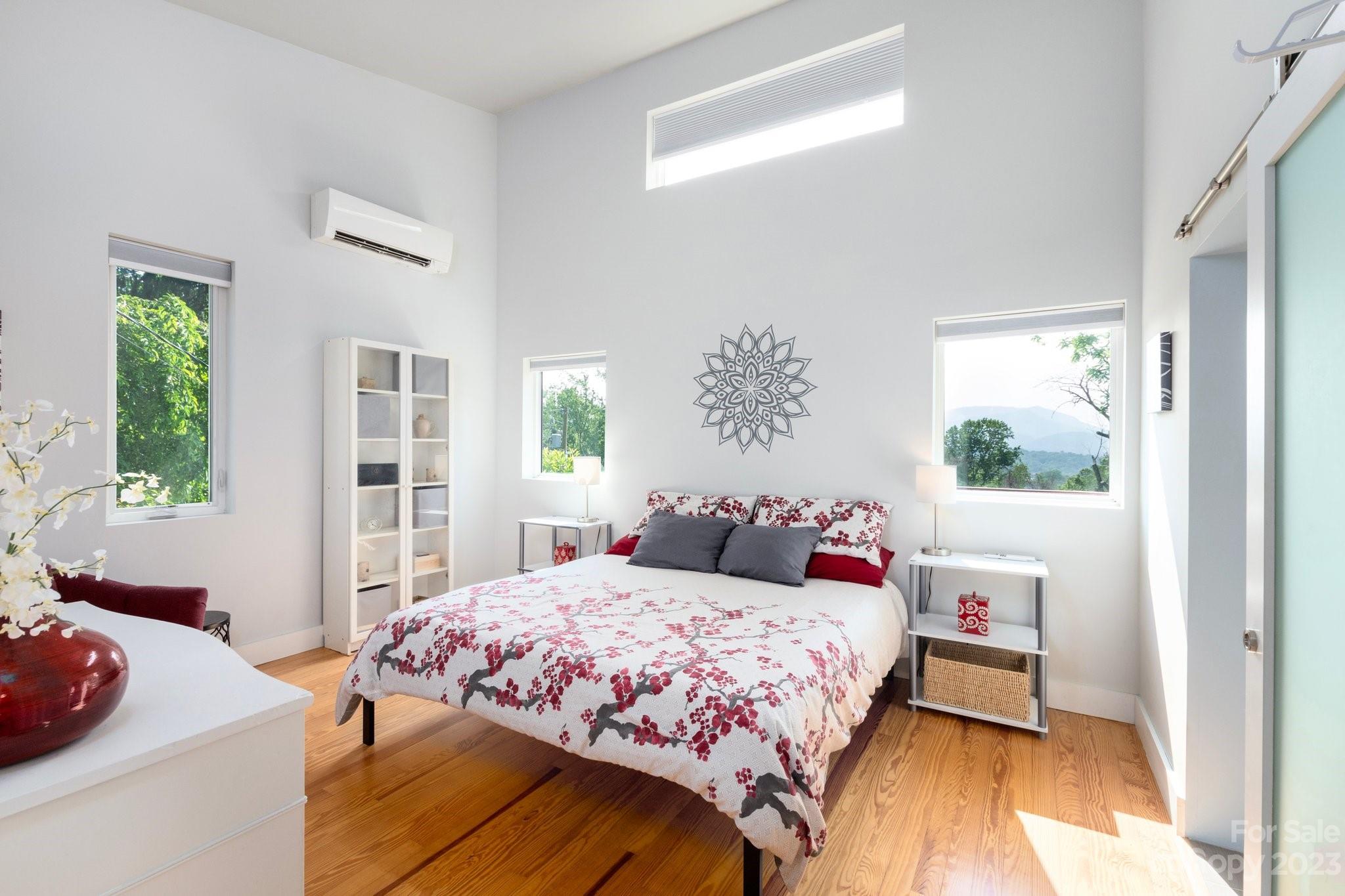 43 Kirkman Road Asheville, NC 28805 - Photo 17 of 27 a bedroom with a bed and a window