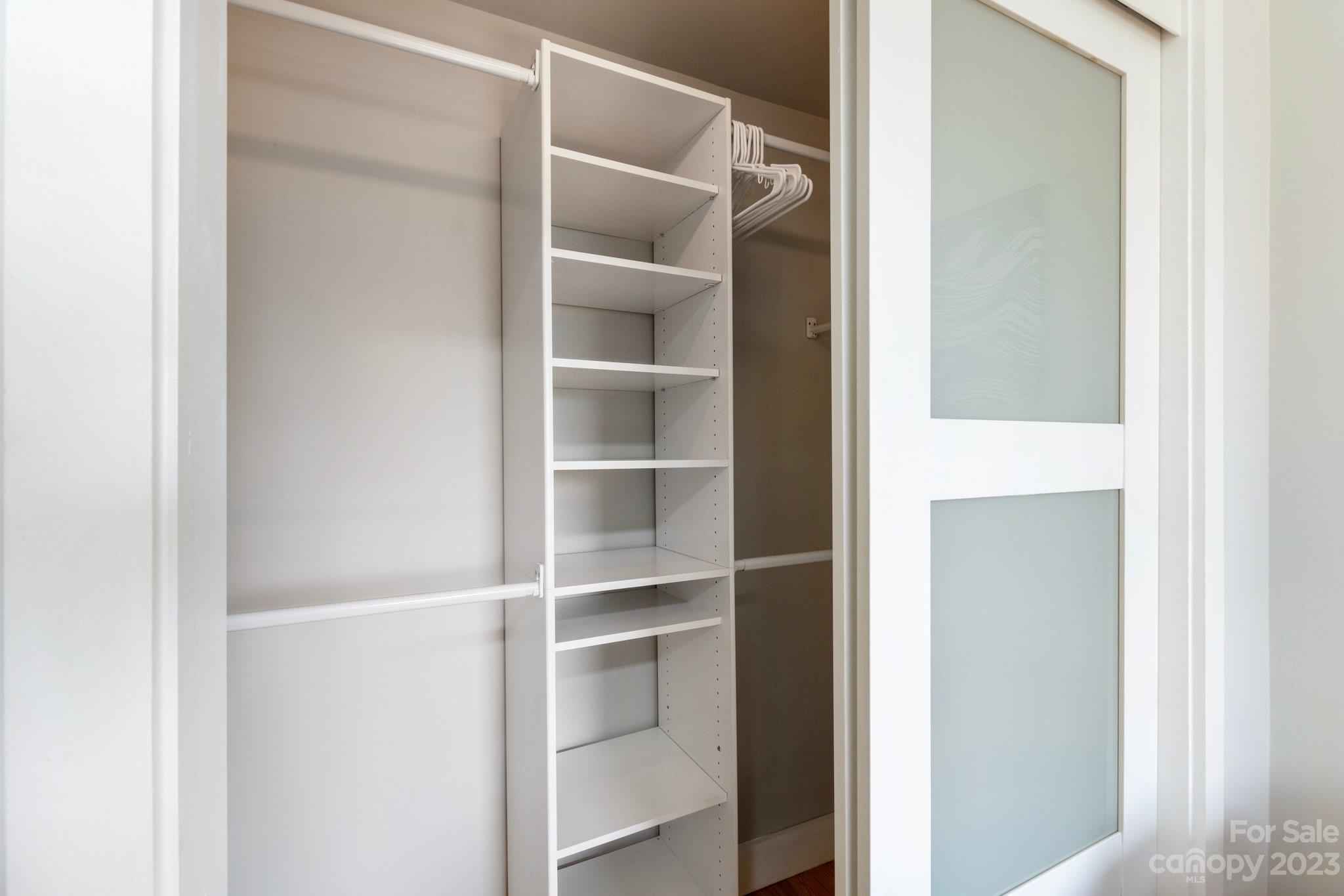 43 Kirkman Road Asheville, NC 28805 - Photo 19 of 27 a view of walk in closet with empty racks