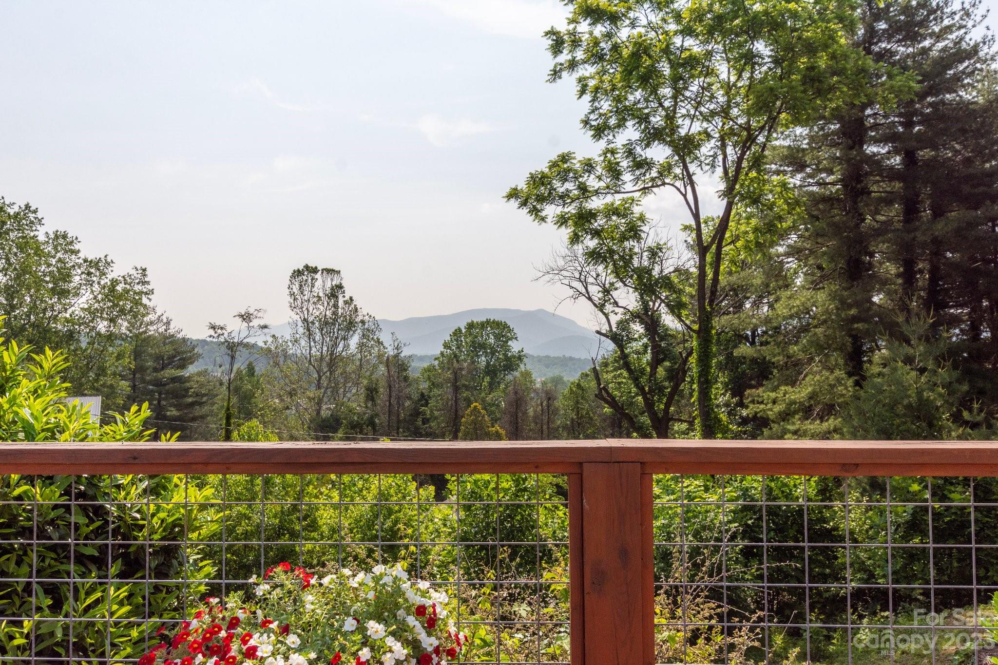 43 Kirkman Road Asheville, NC 28805 - Photo 2 of 27 a view of a balcony with mountain view