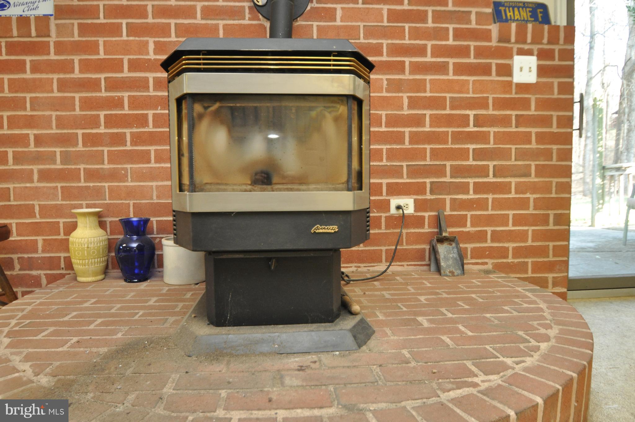 2597 Manchester Road Westminster, MD 21157 - Photo 6 of 14 PELLET STOVE LOCATED IN REC ROOM ON LOWER LEVEL