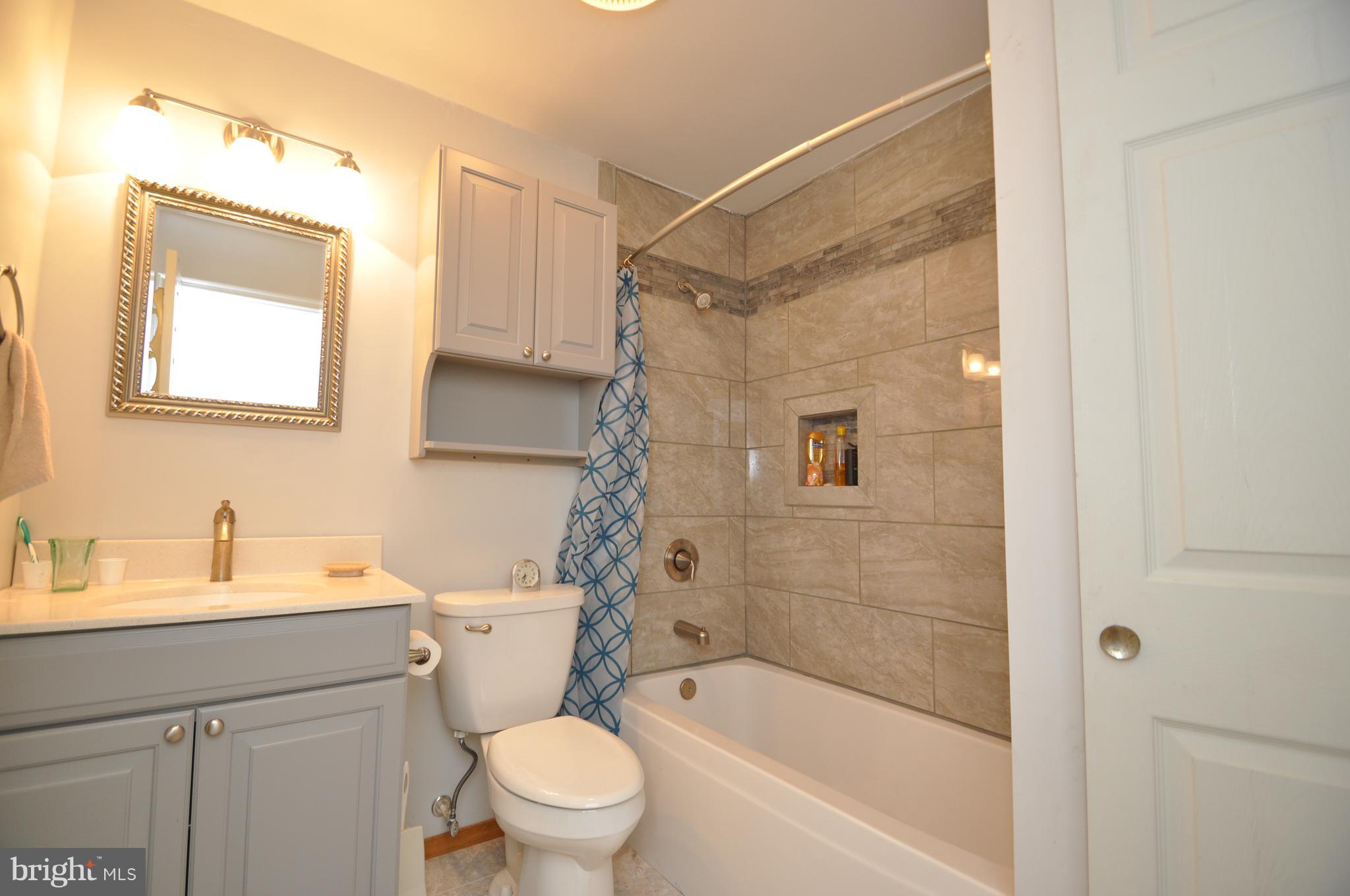 2597 Manchester Road Westminster, MD 21157 - Photo 9 of 14 RECENTLY UPDATED BATHROOM IN HALL.
