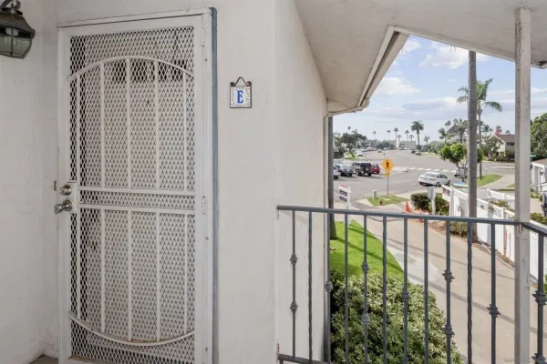 a view of balcony with furniture